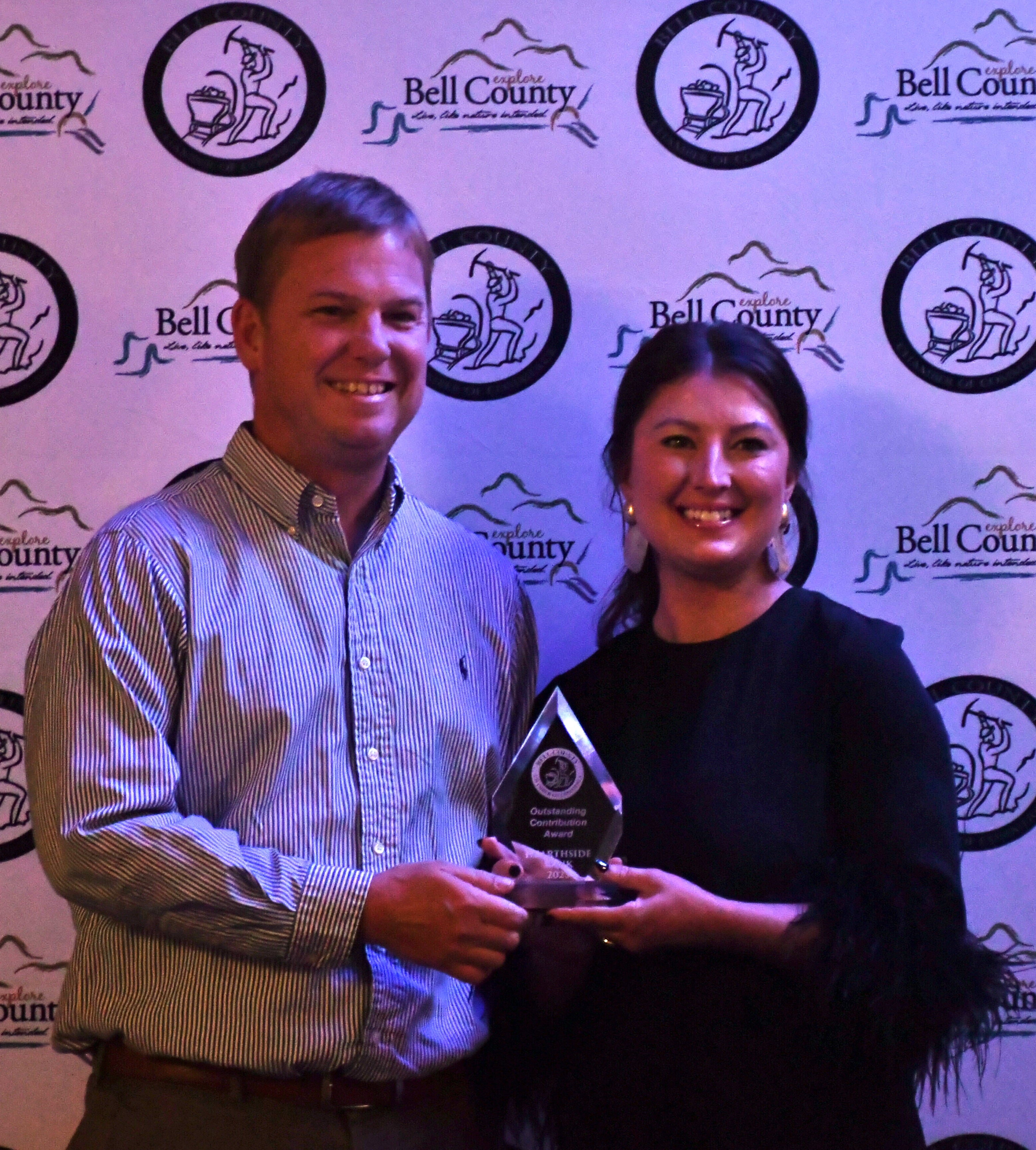 OUTSTANDING CONTRIBUTION AWARD WINNER HEARTHSIDE BANK (LEFT) WITH CHAMBER OF COMMERCE DIRECTOR MELISSA TURNER (RIGHT)